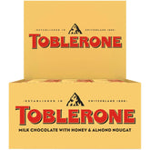 TOBLERONE Milk Chocolate Bar with Honey and Almond Nougat, Bulk Chocolate, 12 - 3.52 oz Bars