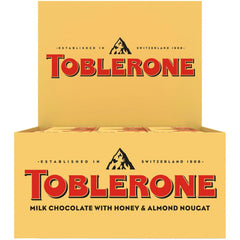 TOBLERONE Milk Chocolate Bar with Honey and Almond Nougat, Bulk Chocolate, 12 - 3.52 oz Bars